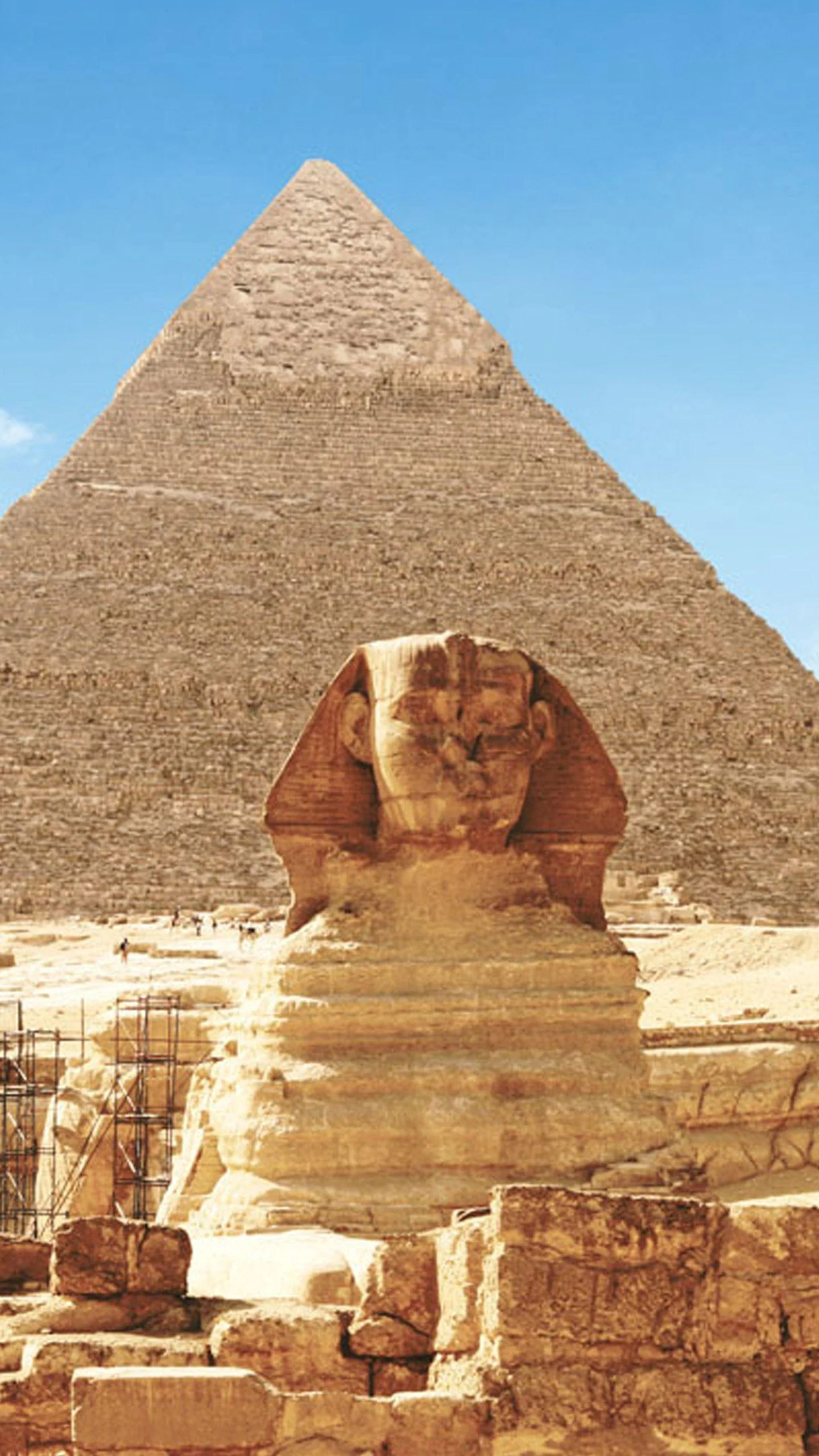 The Sphinx and pyramids beneath a bright Egyptian sky